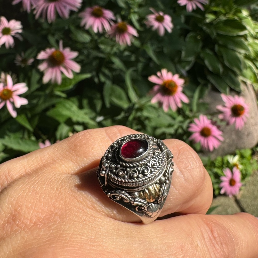 925 Sterling Silver and yellow gold vintage “poisoner’s ring” with garnet